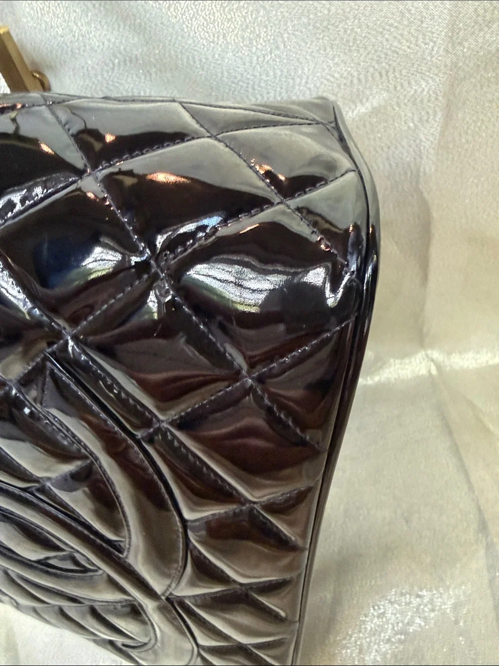 CHANEL glossy black